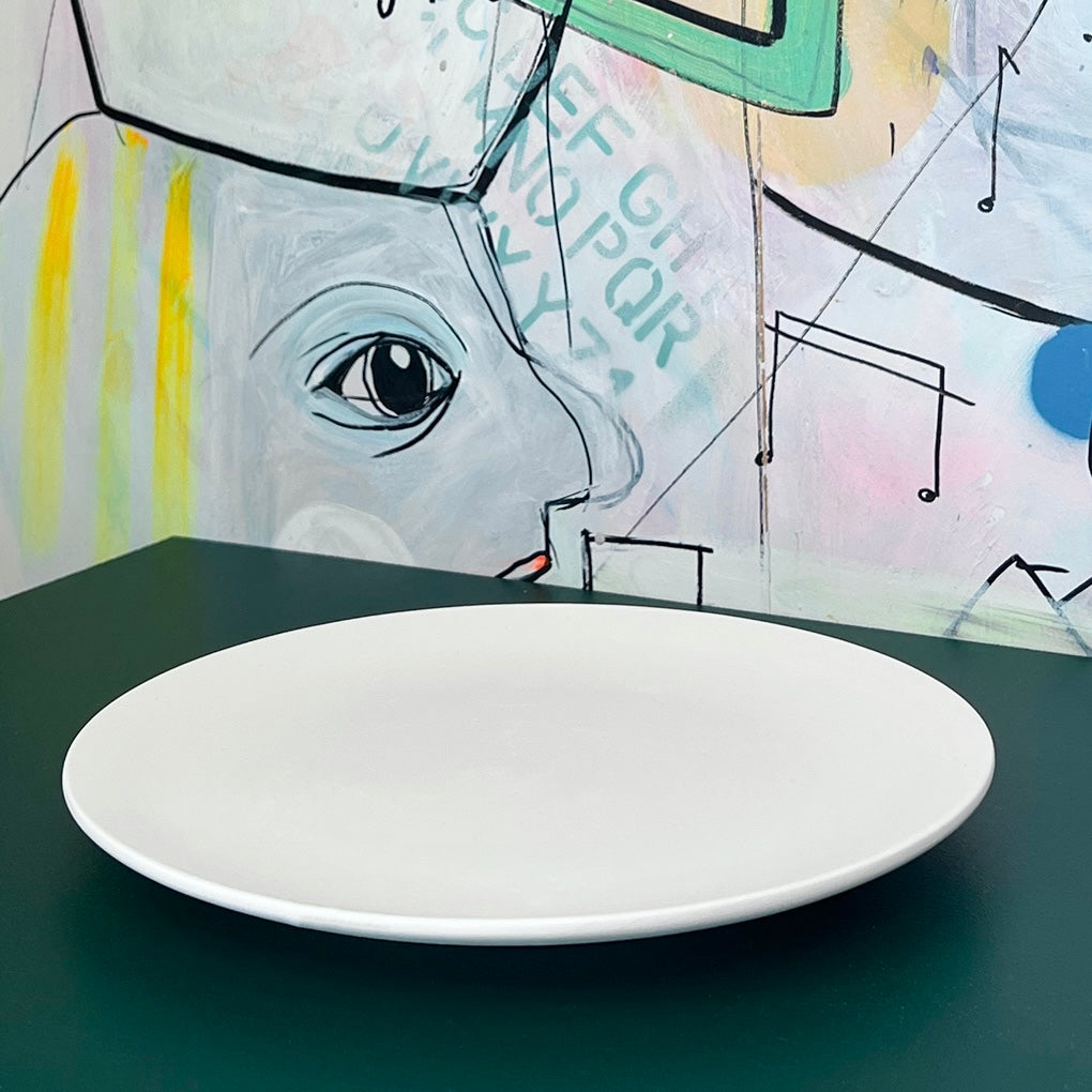 Middagstallerken i hvid keramik