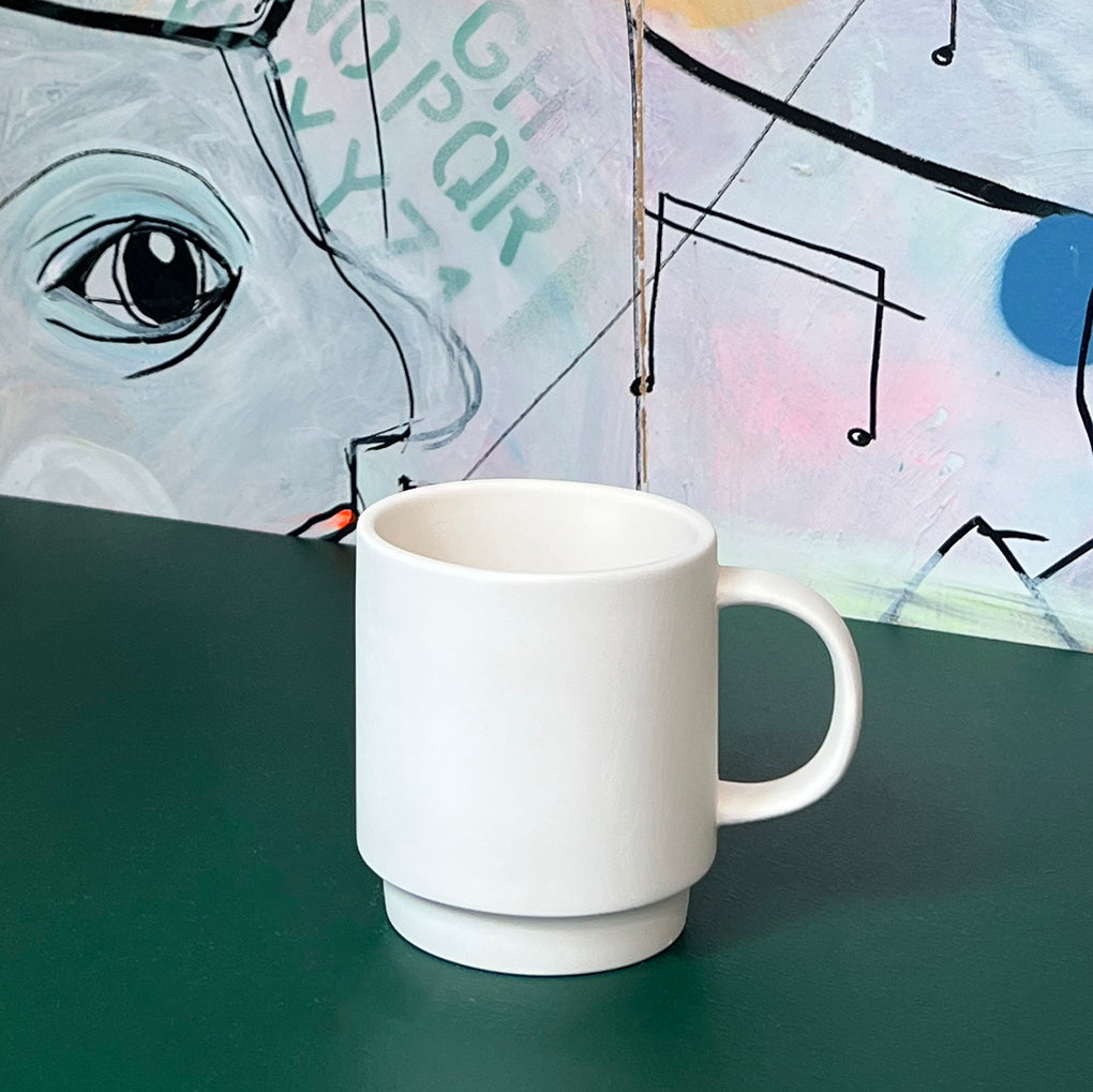 Læreværelses kruset i hvid keramik