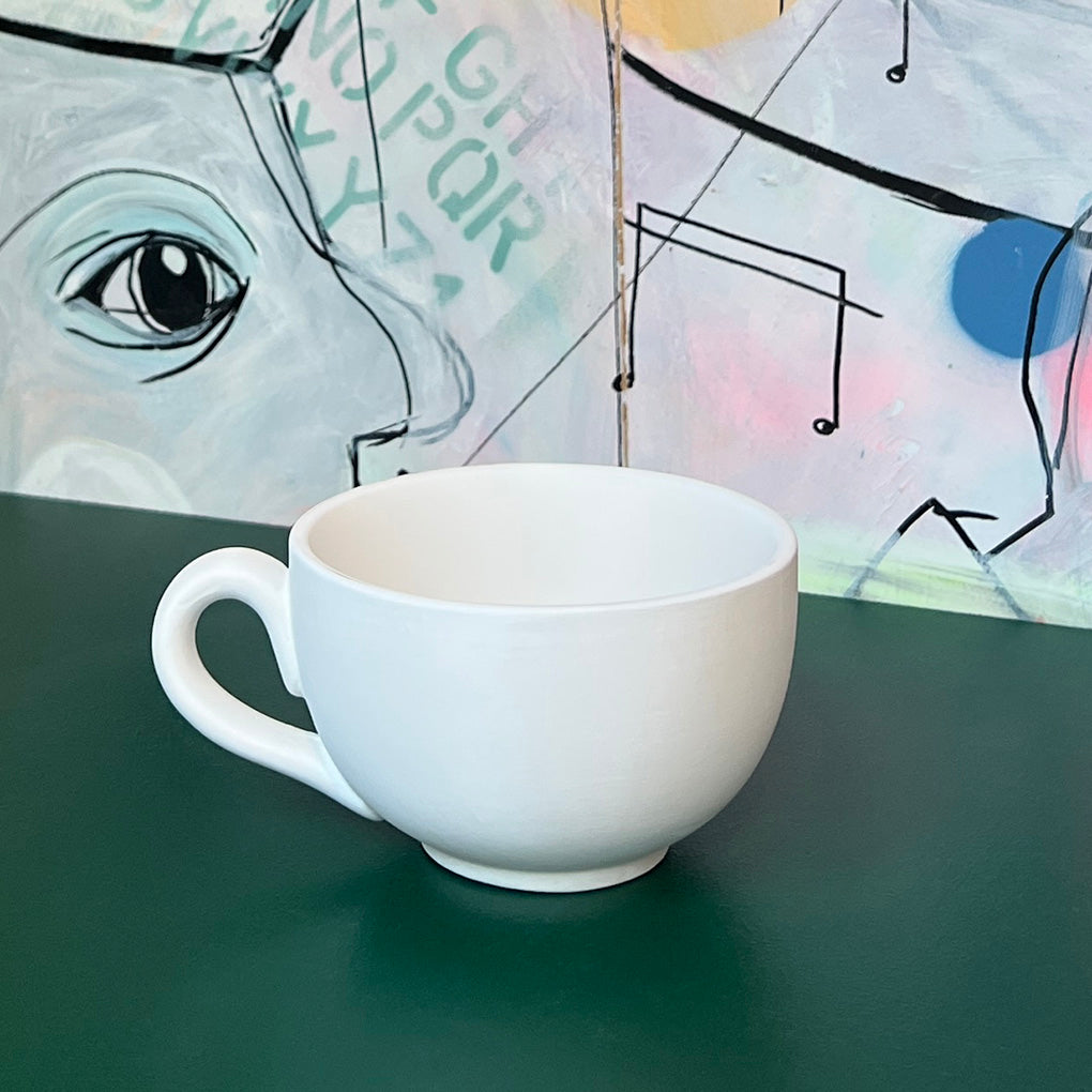 Stor tekop i hvid keramik