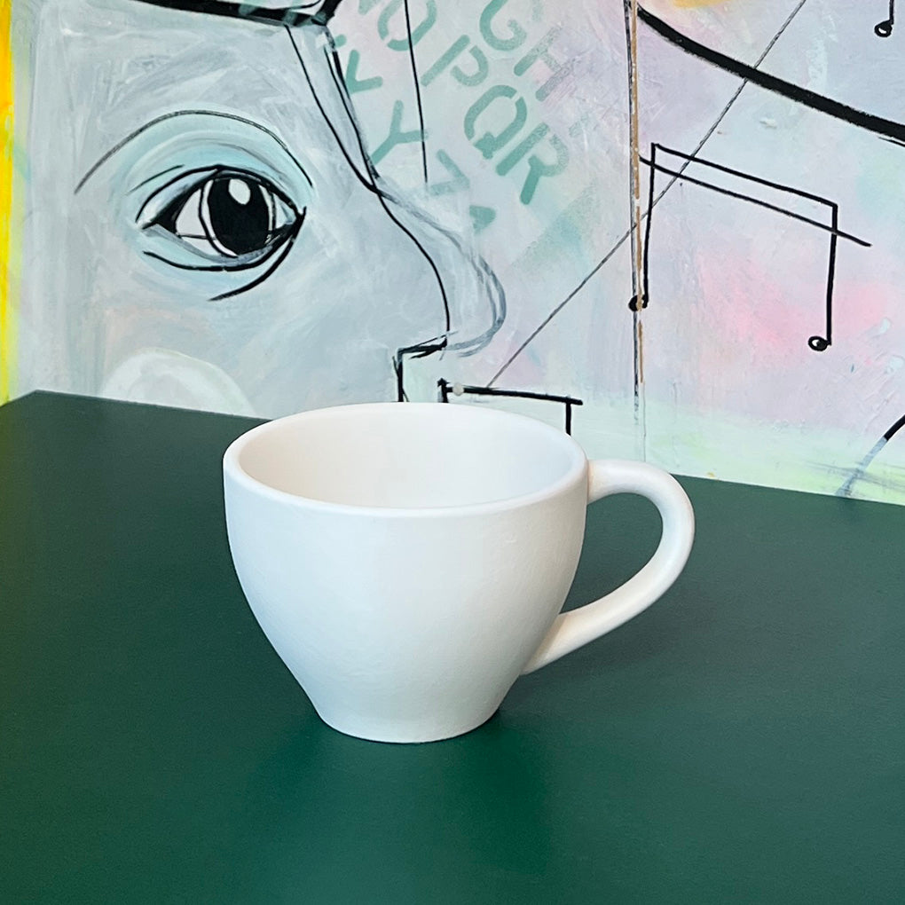 Kaffekop i hvid keramik