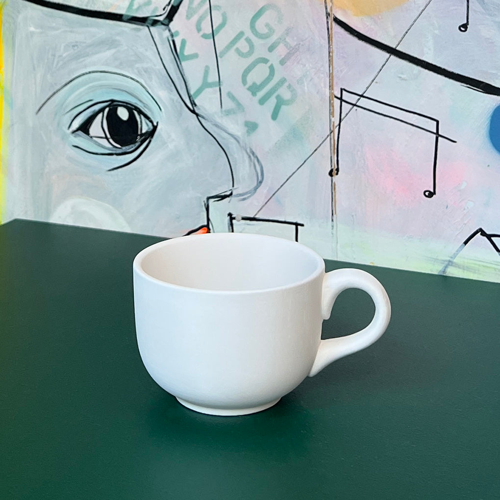 Flora koppen i hvid keramik